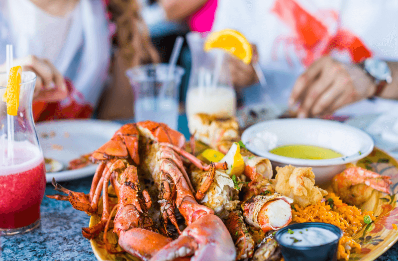 Sea food platter with drinks around