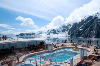 Pool in a cruise with snowy mountains in the background